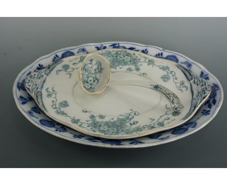 An Acacia pattern ashet and ladle, together with a blue-and-white ashet