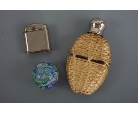 A hip flask, large glass marble and vintage Fork brand cigarette lighter