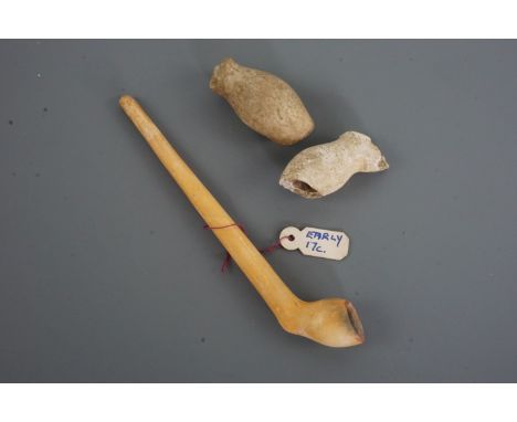 Two 16th / 17th Century clay pipe bowls and a pipe