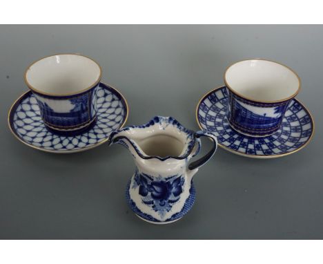 Hand-decorated Saint Petersburg Russian porcelain cups and saucers together with a jug