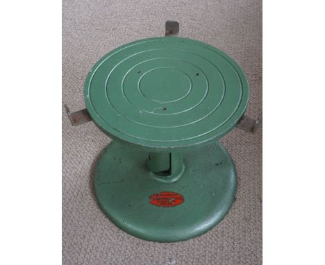 A mid 20th Century cake decorating stand by Torrington &amp; Sons Ltd. Portsmouth