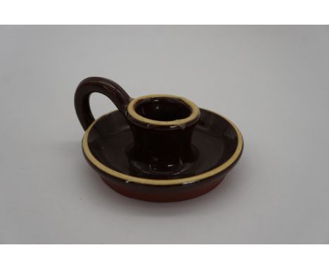 A Wetheriggs pottery chamber stick