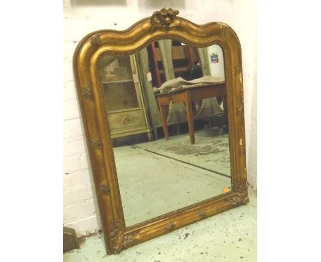 WALL MIRROR, 19th century Continental giltwood and gesso, of compact proportions with a shaped frame with decorative detail, 