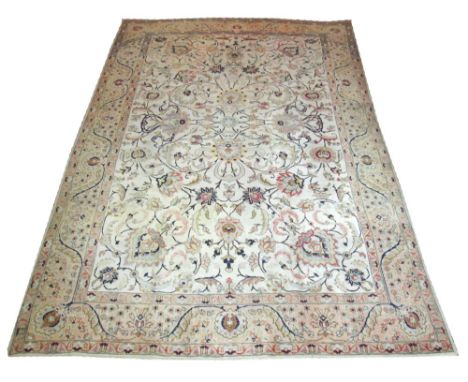 FINE PERSIAN ANTIQUE TABRIZ CARPET, 345cm x 230cm, all over design of palmettes and vines on an ivory field inside correspond