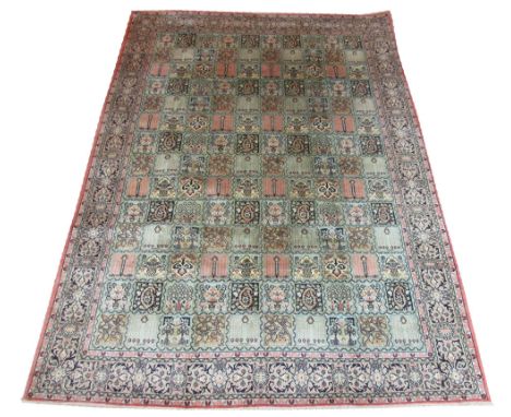 KASHMIR SILK CARPET, 269cm x 183cm, tiled garden design within a corresponding border.