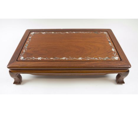 CHINESE LOW TABLE, 20th century rosewood with mother of pearl inlaid trailing foliate border, short cabriole legs, 55cm x 35c