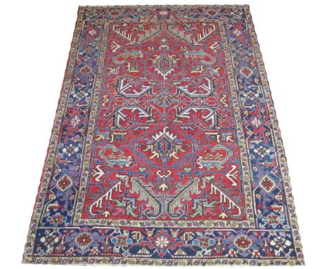 VINTAGE SERAPI CARPET, 270cm x 181cm, stylised leaves, vines and palmettes on a terracotta field inside a corresponding bands