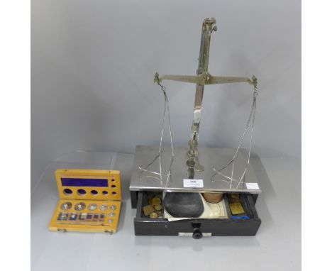 A set of vintage steel chemist's scales with weights 