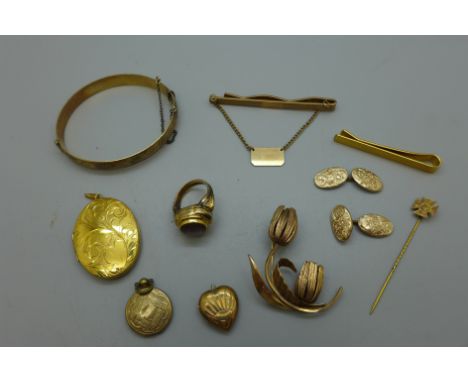 A collection of gold plated and rolled gold including a bangle marked 'Guaranteed 40 years', a ring watch and a locket set wi