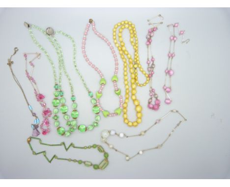 Nine vintage bead necklaces 