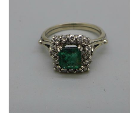 A white metal set, emerald and diamond ring, 3.5g, M 