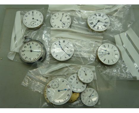 A Timex pocket watch and pocket watch movements