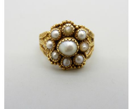 An antique yellow metal and pearl cluster ring, 5.4g, J 