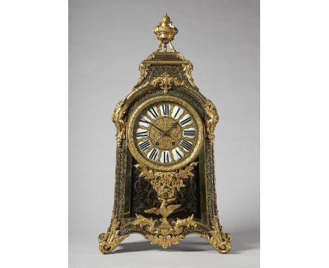 An ormolu-mounted, tortoiseshell and cut brass-inlaid mantel clockIn the Louis `XIV style, after André-Charles Boulle, second