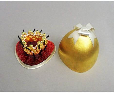 A Stuart Devlin Christmas box, containing a silver gilt, silver and enamelled model representing the ninth day of Christmas, 