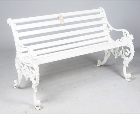 After McLaren &amp; Co.; a white painted 19th century cast iron garden bench, with foliate cast and lions head finials, 129cm