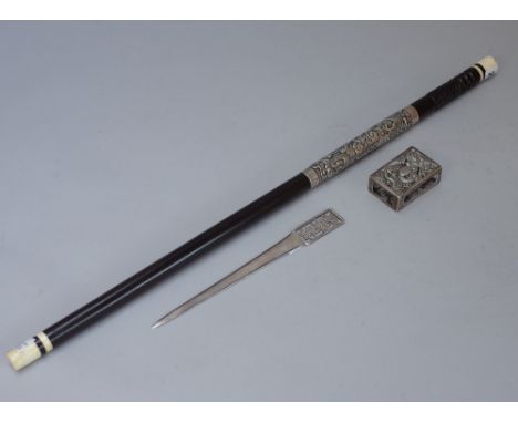 An Anglo Chinese ebony and ivory mounted swagger stick, late 19th/early 20th century, with wide silver collar decorated in re