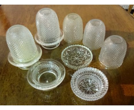 A large quantity of modern moulded glass candle and tea light holders, (qty).