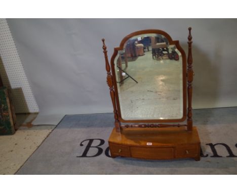 A Victorian mahogany swing frame toilet mirror with three drawer base, 61cm wide x 85cm high. 