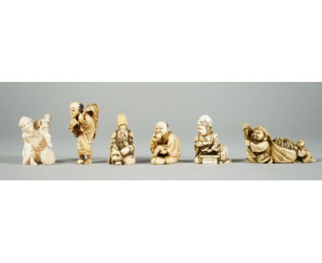 A group of six Japanese ivory netsuke, late 19th/early 20th century, comprising; a man with a monkey; a man eating fruit; a b