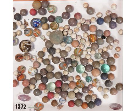 A quantity of vintage and antique marbles, including blown glass and ceramic, (qty).