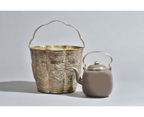 A polished Yixing teapot and cover made for the Thai market, with Thai silver holder, late 19th/20th century, the teapot with