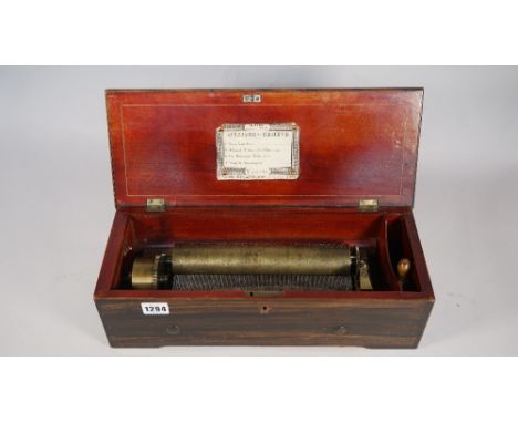 A Nicole Freres Swiss walnut and inlaid music box, late 19th century, playing 'Four Airs' on a nine inch brass roller, 41cm w