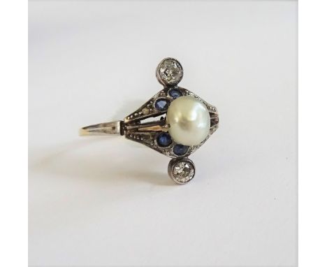 A diamond, natural salt water pearl and blue gem set ring, mounted with the natural salt water pearl to the centre and with t