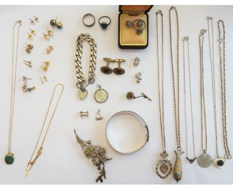 A group of mostly silver jewellery, comprising; two rings, a ring with a matching pair of earstuds, two further pairs of ears