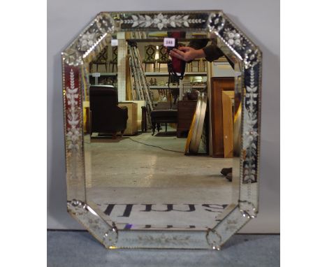 An early 20th century Venetian style octagonal wall mirror with bevelled glass, 60cm wide x 76cm high. 