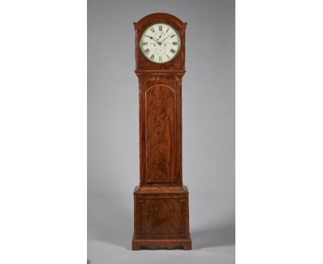 A late Regency mahogany longcase clockBy Newsome, TottenhamThe case with a shallow arch above a brass bezel and convex glass,