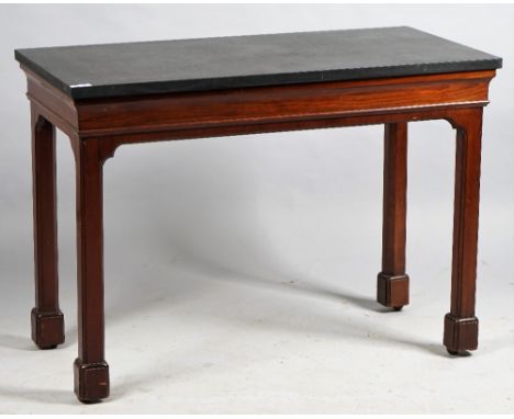 A console table, the rectangular black marble top on a mid-18th century design mahogany base of four canted square supports, 