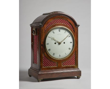 A Regency mahogany bracket clockBy Ellicott & Taylor, London, circa 1820The arched case with a pad top, above grille sides an