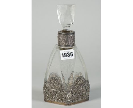 An engraved glass liqueur decanter and stopper with Dutch silver mounts, circa 1930, the glass engraved with fruiting vine, t