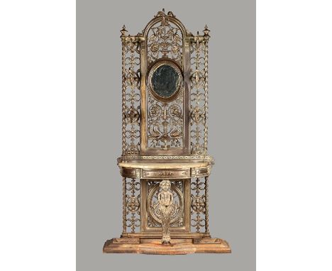 A cast iron coat and umbrella stand, the mirror back with pierced foliate decoration over marble demi-lune platform on cherub