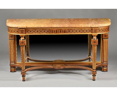 In the manner of George Bullock; a 19th century console, the 'D' shape marble top on an inlaid parcel gilt oak base with tape