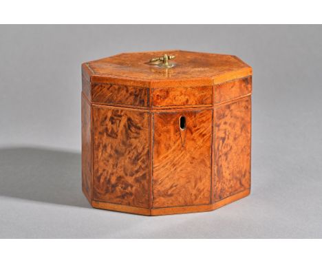 A George III burr yew wood tea caddy of compressed octagonal form, with twin compartment interior, 16cm wide x 13cm high. Ill