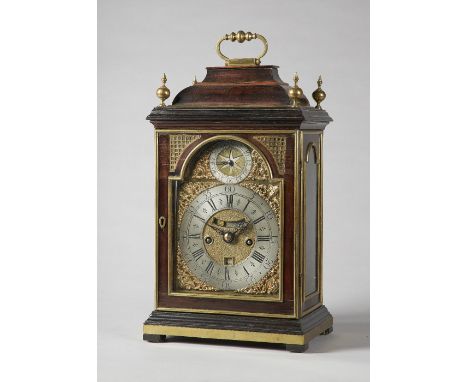 A George I brass-mounted fruitwood striking table clock with pull-quarter repeat By Simon de Charmes, London Th bell-top case