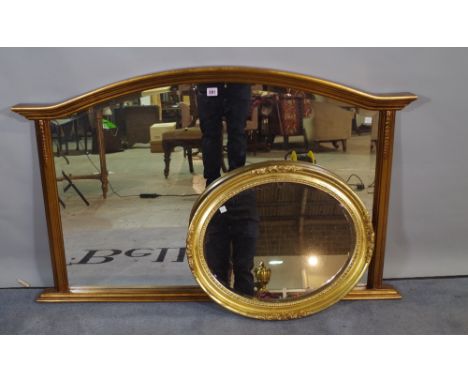 A 20th century gold painted arch top overmantel wall mirror, 121cm wide x 81cm high.