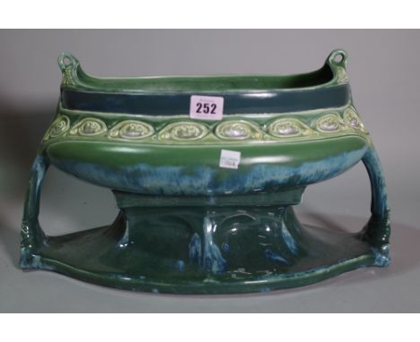 An Austrian green and turquoise Art Nouveau jardiniere, (a.f). 