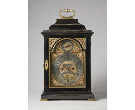 A giltmetal-mounted ebonised bracket clockInscribed George Clarke, LondonThe inverted bell-top case with a brass carrying han