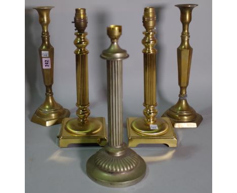 Lighting, comprising; five mid 20th century brass table lamps, to include two pairs and a single, the tallest 32cm high, (5).