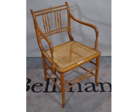 A 19th century stained beech, bamboo open armchair with caned seat, 49cm wide x 83cm high. 