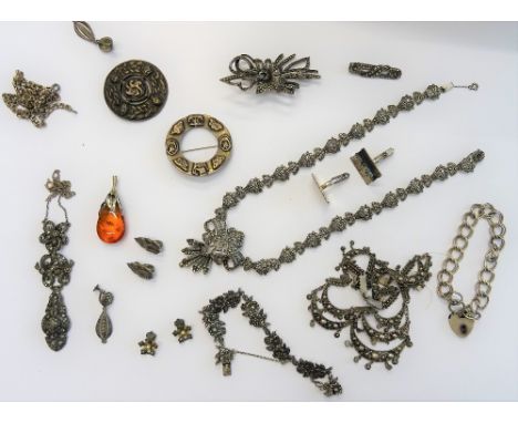 A collection of mostly silver jewellery, comprising, a silver and marcasite set necklace, in a fanned link design, on a snap 