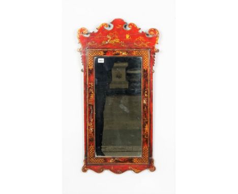 A George II style red lacquer fret cut wall mirror, 45cm wide x 87cm high. 