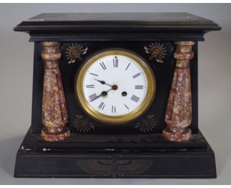 An early 20th century Egyptian Revival black slate cased mantel clock, 35cm wide. 