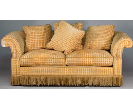 A modern yellow square check upholstered sofa with roll over arms and tassel frieze, 210cm wide x 78cm high. 