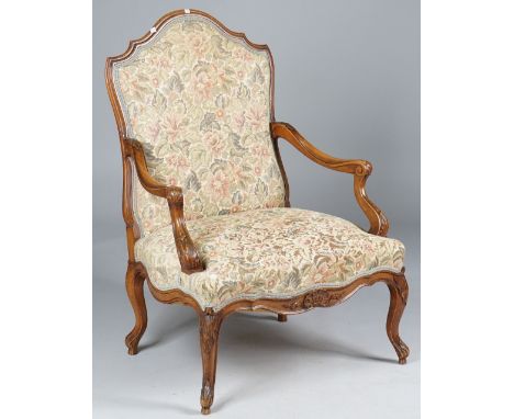 White Star Line's RMS Majestic; a Louis XV style beech framed open armchair with hump back and serpentine seat on cabriole su