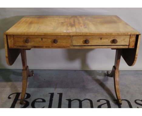 A Regency mahogany sofa table with two drawers on duel ended supports. 