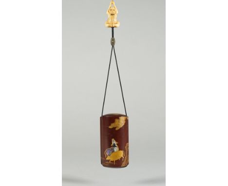 A Japanese brown- ground four-case inro, 19th century, decorated in gold lacquer and shell with three oxen beneath a pine tre